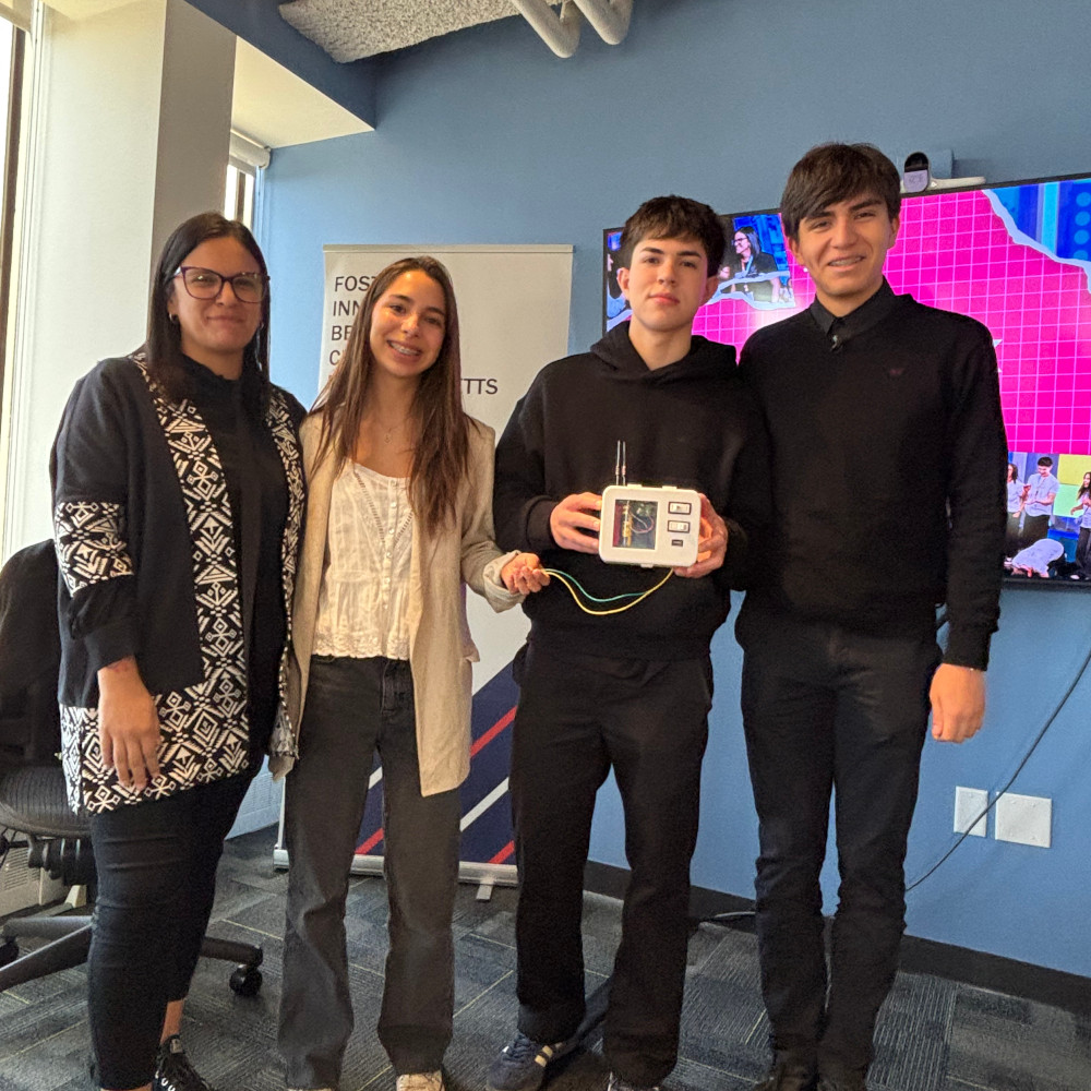 Three students and their teacher